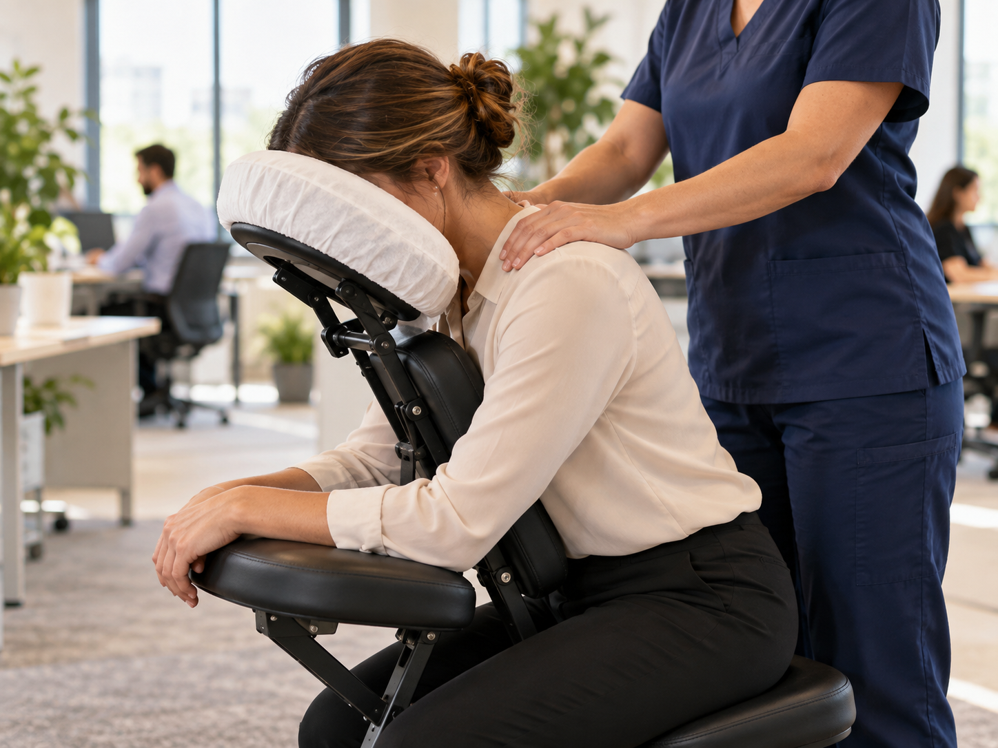 Illustrative scene of an employee receiving chair massage in an office